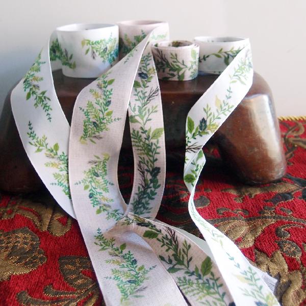 1 1/2" Tan ribbon with green leaves - 1.5" x 10.9 yards